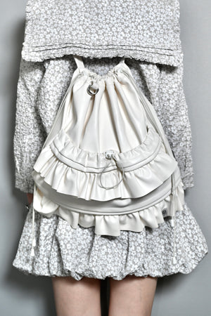 soft vegan leather frill knapsack