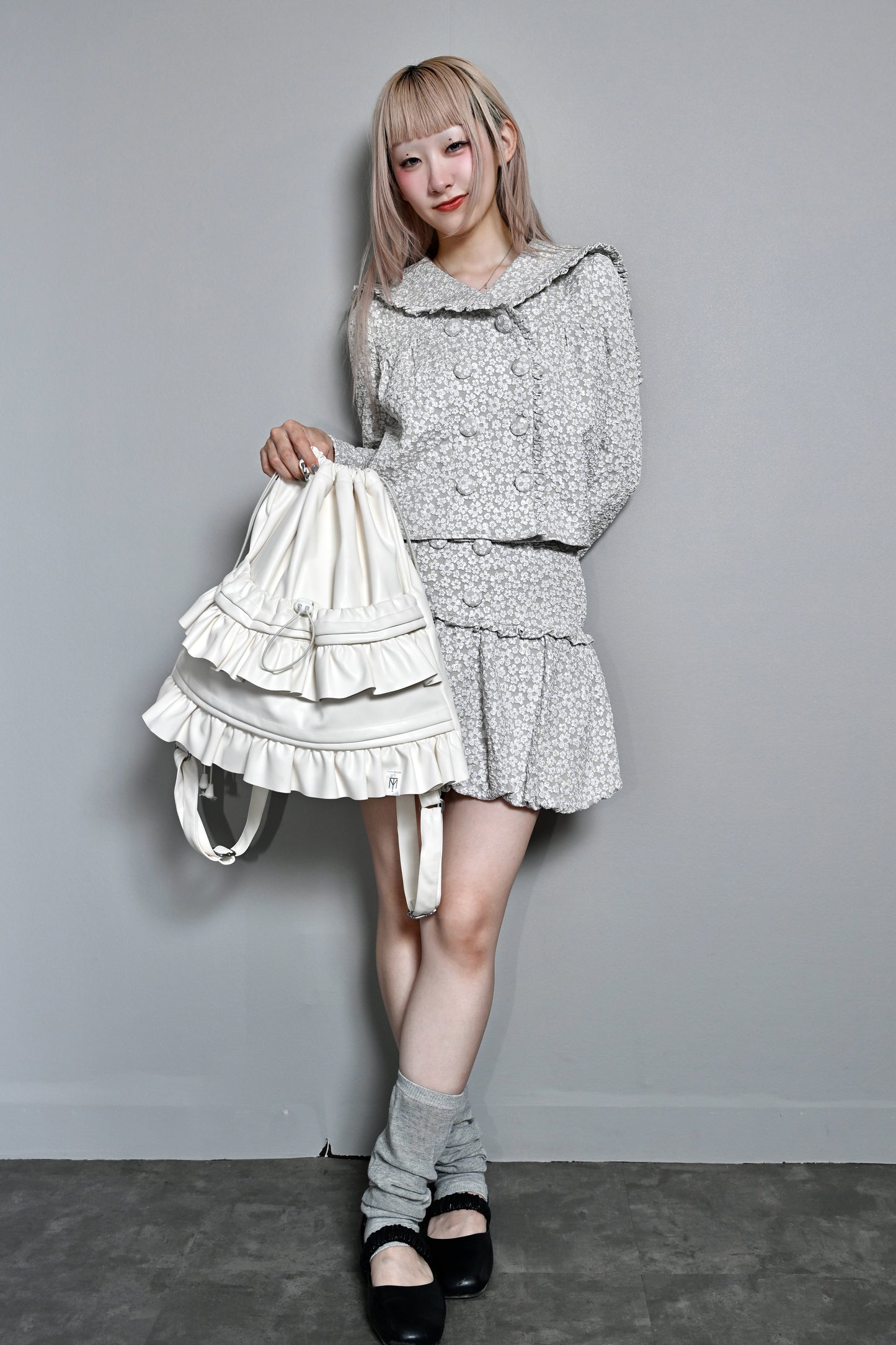 soft vegan leather frill knapsack