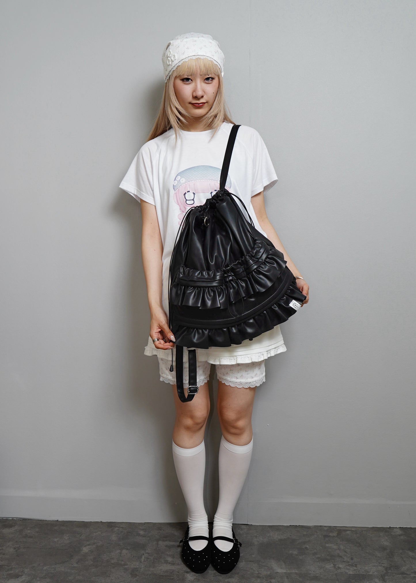 soft vegan leather frill knapsack