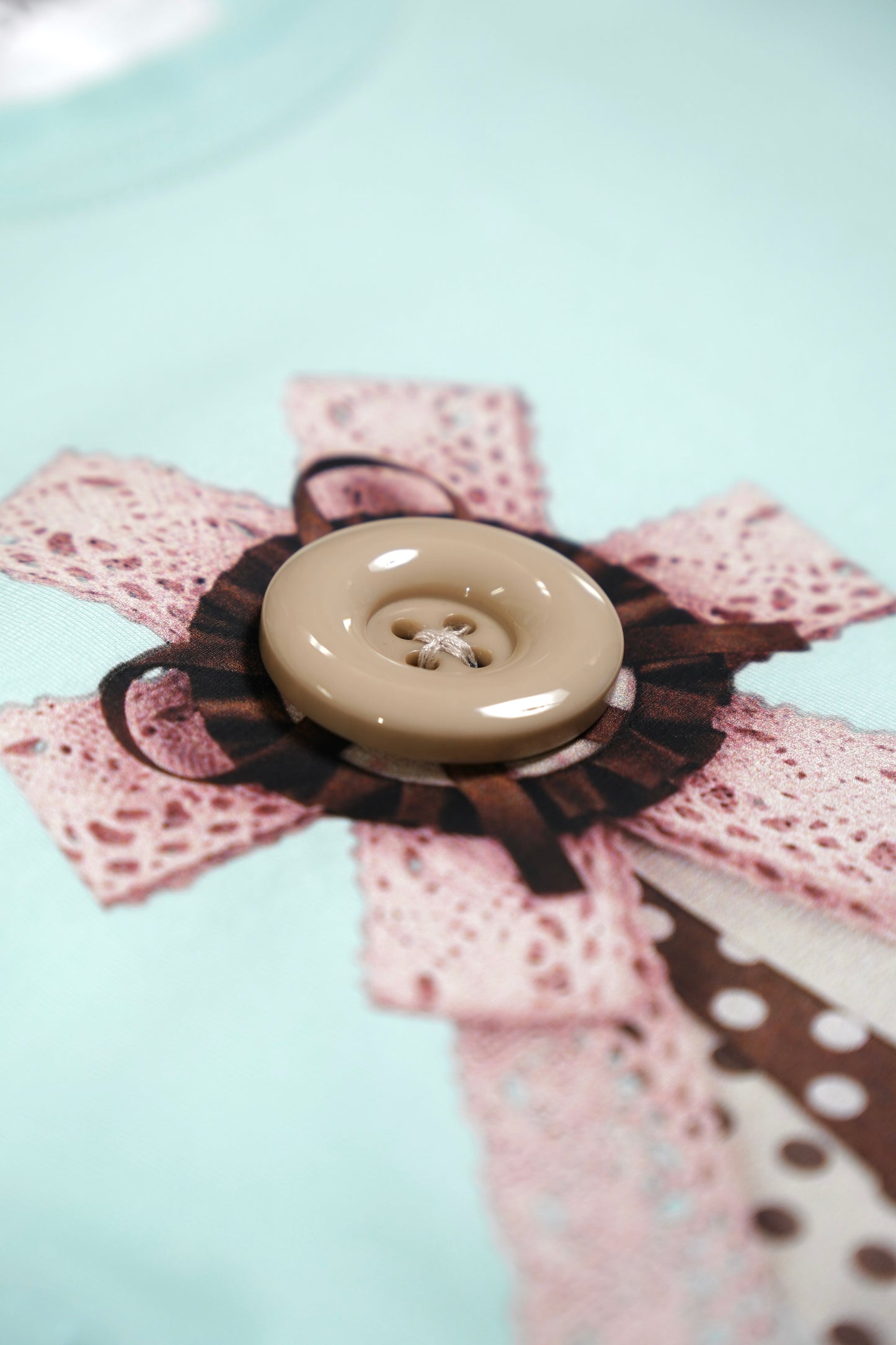 ribbon rosetta button tee