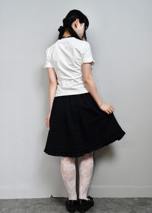 ribbonful whispers Tee